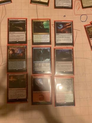 Some of the notable cards in the miscut deck, shown in the middle row, with their print neighbors on adjacent rows.
